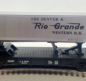 LIONEL 16374 DENVER AND RIO GRANDE WESTERN FLATCAR WITH TRAILER